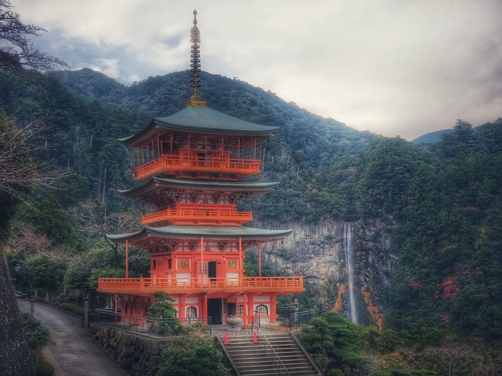 three storied pagoda and waterfall